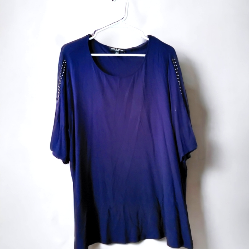 Navy blue top with peek a boo sleeves.